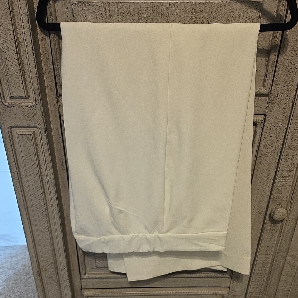 Tahari Black Logo Label on White Fabric